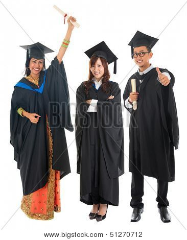 Full body group of multi races university student in graduation gown standing isolated on white background