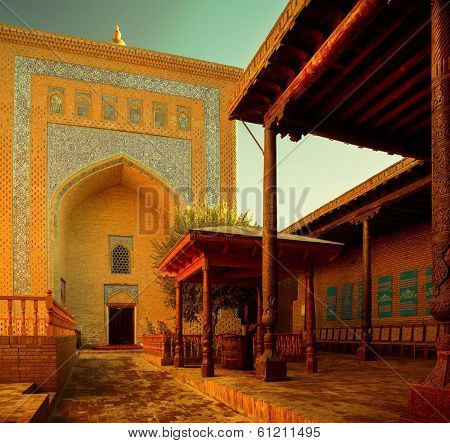Yard of ancient mosque in the city of Itchan Kala, Khiva, Uzbekistan