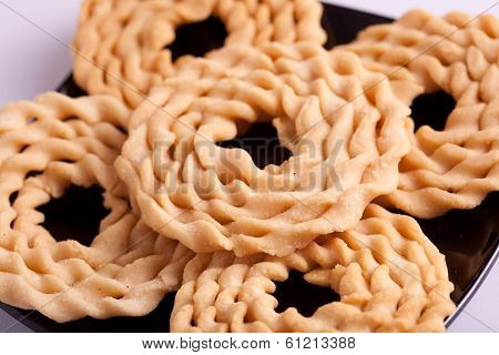 Murukku is a savoury snack from India