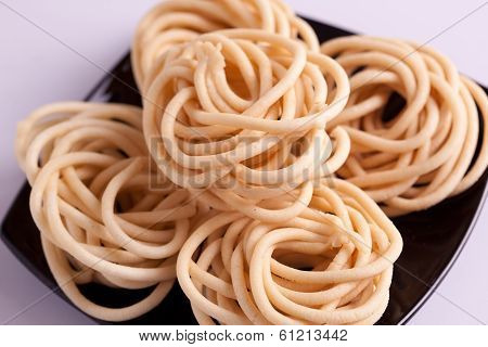 Murukku is a savoury snack from India
