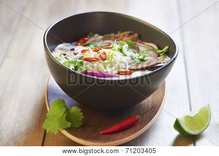 Rice noodle soup with sliced beef