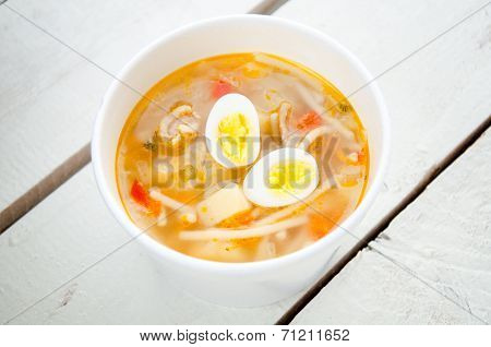 Chicken Soup With Noodles And Boiled Eggs