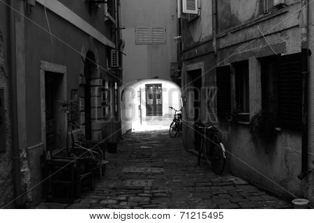 Narow street in mediterainian town of Piran in Slovenia
