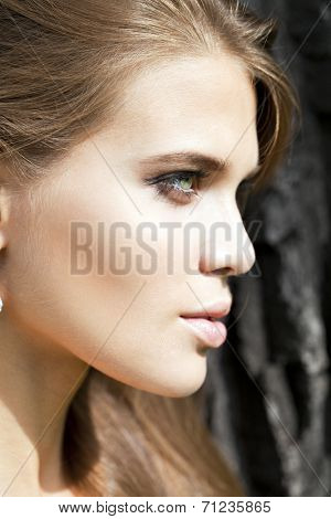 Portrait close up of young beautiful woman