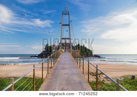 Suspension bridge connecting Pigeon Island, also called Parevi Doowa in Matara, Sri Lanka