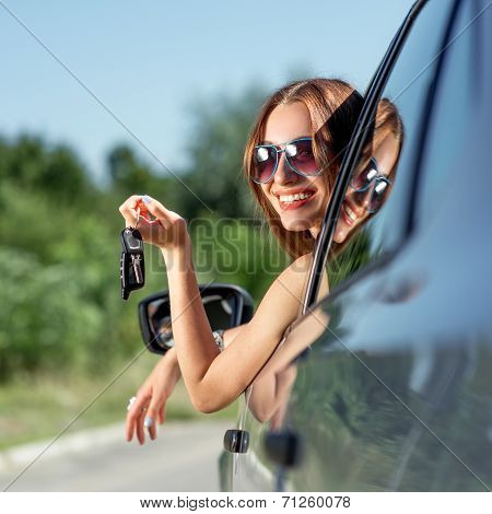 Car Driver Woman Happy Showing Car Keys Out Window