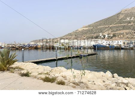 AGADIR, MAROCCO - AUGUST 27: View of fishing boats in Essaouira port on 27 August 2014 in Agadir, Marocco. Morocco is one of the largest producers of sardines in the world.