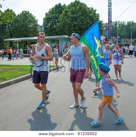 Russian Paratroopers Demobilized With A Flag And A Little Boy