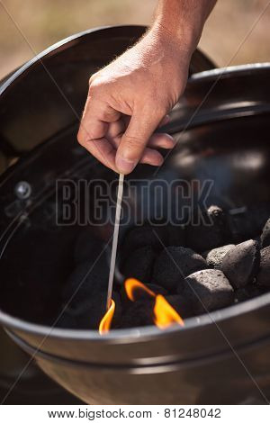 Lights Fire in a BBQ