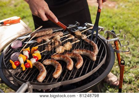 Fresh meat and vegetables on outdoor grill