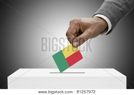 Black Male Holding Flag. Voting Concept - Benin