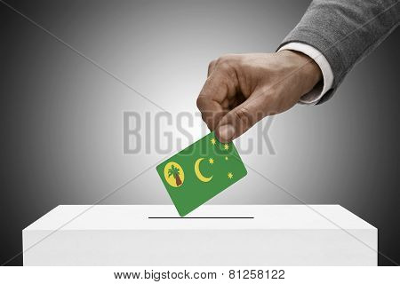 Black Male Holding Flag. Voting Concept - Cocos (keeling) Islands