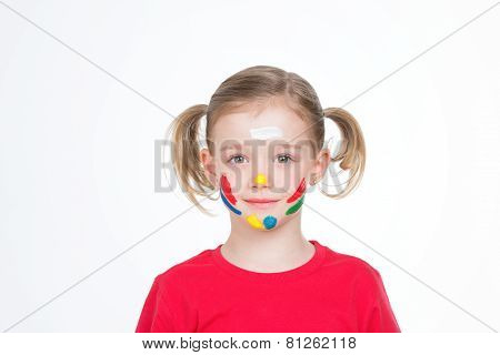 Young Child With Color On Her Cheek