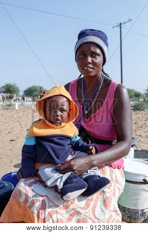 Small Namibian Child With Mother