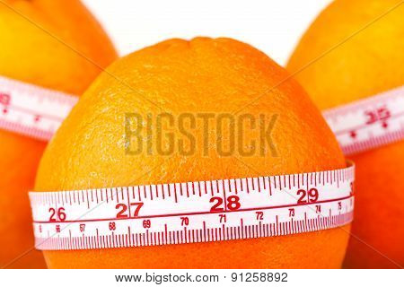 Three Oranges With Tailor's Ruler. Orange Diet. Fruit Healhy Vitamin Diet Helps To Lose Weight.