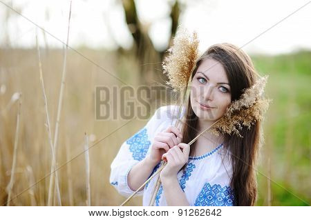 Slavic Girl In Ukrainian Shirt Holding Ears Of Corn