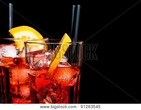 Glasses Of Spritz Aperitif Aperol Cocktail With Orange Slices And Ice Cubes With Space For Text