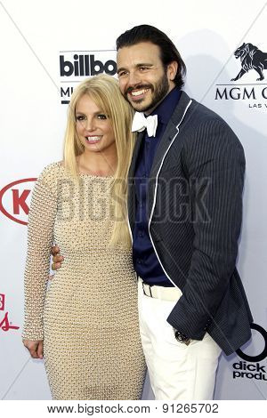 LAS VEGAS - MAY 17: Britney Spears, Charlie Ebersol at the 2015 Billboard Music Awards at the MGM Grand Garden Arena on May 17, 2015 in Las Vegas, Nevada.