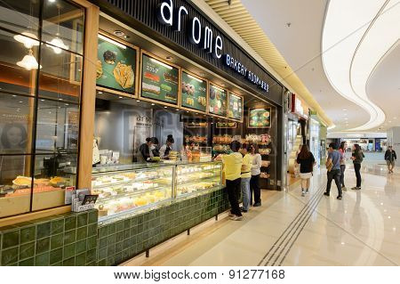 HONG KONG - APRIL 23, 2015: The PopCorn Shopping Malll interior. Hong Kong shopping malls are some of the biggest and most impressive in the world.