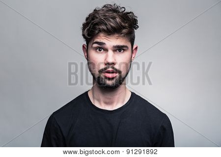 Professional studio portrait of young handsome man