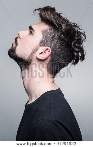 Professional studio portrait of young handsome man