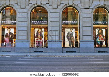 BARCELONA SPAIN - DECEMBER 9 2014: Facade of Burberry flagship store in the street of Barcelona on December 9 2014. Burberry is a luxurious clothing brand based in Great Britian.