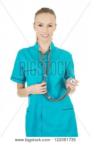 Smiling woman doctor with stethoscope.