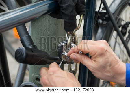 Lockpicker Fixing Lock Of Cycle