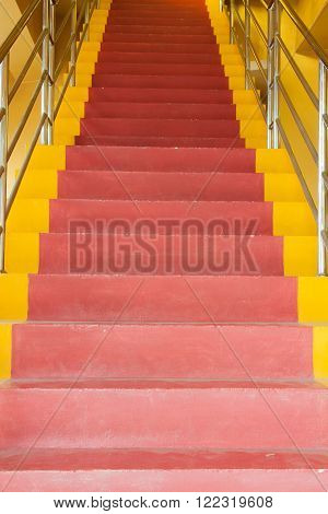 Red and yellow ladder at thai temple