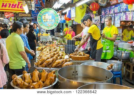 NAKORN PATHOM THAILAND MAR 13 : vendors are selling some food at Don Wai Floating market on 13 March 2016