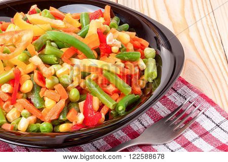 Mexican Mix of Vegetables. Tomatoes, Beans, Celery Root, Green Beans, Peas, Corn. Dietary Food.