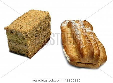 Cake and éclair isolated on a white background