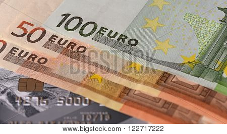 part of the credit card on the table closeup