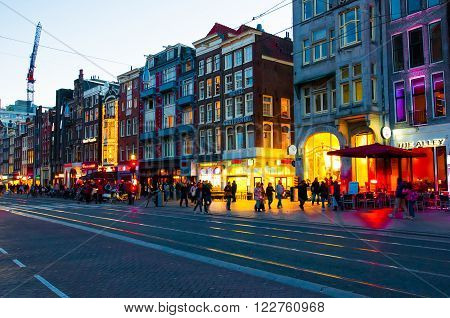 AMSTERDAM-APRIL 27: Nightlife on Rokin street during on April 272015 in Amsterdam. Rokin is a major street in Amsterdam the Netherlands.