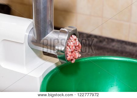 Meat grinder. In the kitchen, we get the stuffing.