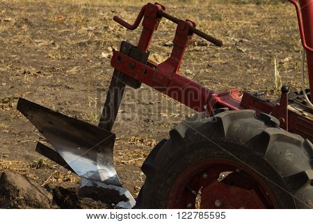 DIKANKA UKRAINE - SEPTEMBER 30 2015: Plowing garden tractor motor-block Motor Sich MB-405