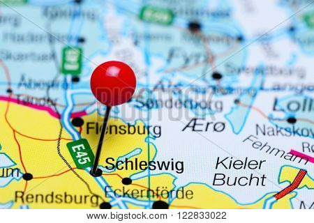 Photo of pinned Schleswig a map of Germany. May be used as illustration for traveling theme.