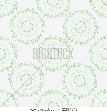 Decorative boho seamless pattern. Endless print with green monochromatic round ornaments on white background. Colorful repeating tribal artistic backdrop. For cloth design wallpaper or wrapping