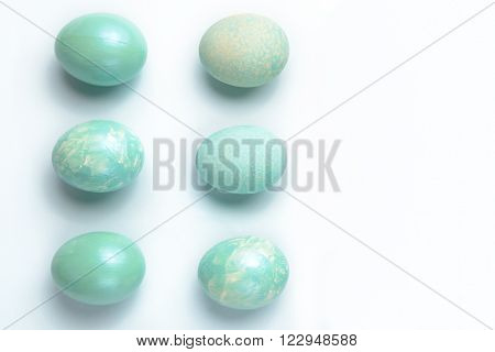 Easter decoration six turquoise eggs painted with acrylic paint