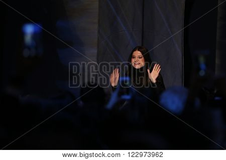 ISTANBUL TURKEY - MARCH 18 2016: Designer Derya Acikgoz greets the audience after his show in Mercedes-Benz Fashion Week Istanbul