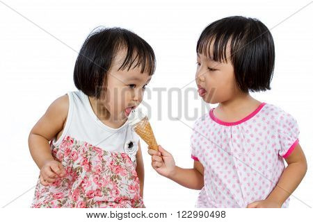 Asian Little Chinese Girls Eating Ice Cream isolated on White Background