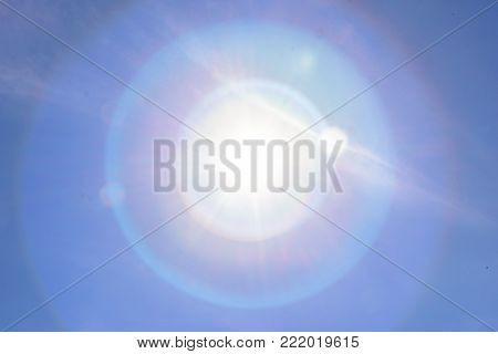 The Sun Lighting With Blue Sky Background.