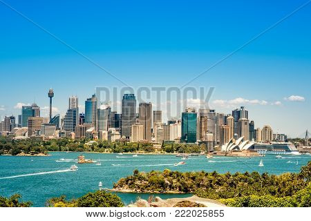 The Sydney Opera House With Ferries Boats In The Foreground, Taken From The Harbor Bridge In Sydney,