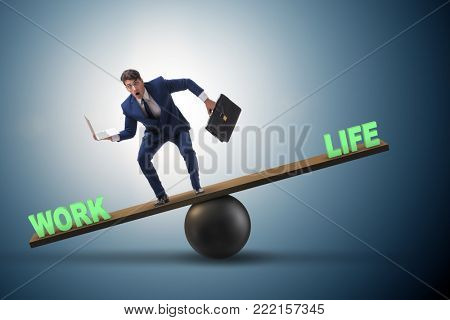 Businessman balancing between work and life in business concept