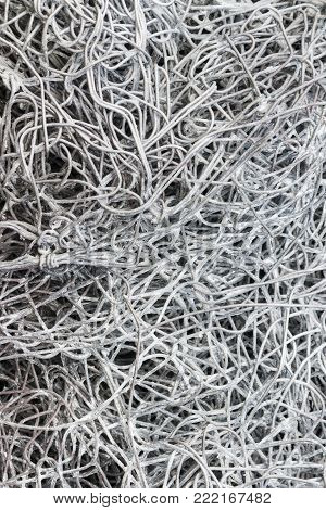 close up of entangled galvanised wire mesh