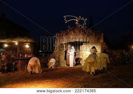 ZAGREB, CROATIA - DECEMBER 20, 2016: The religious spirit in the Advent in Zagreb especially can feel the front of the Cathedral, where Community Cenacolo organizes live Christmas nativity scene.