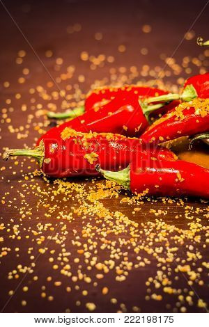 Red Chilli Pickle Marinated In Mustard Seeds And Mustard Oil. Dark Gothic Style Still Life Concept.