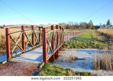 Wooden footbridge in a park at the swedish island Oland