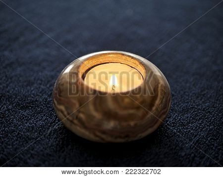 Stone Tea Light Candle on Navy Blue