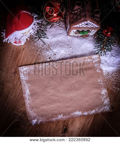 two Santa Claus and blank sheet for Christmas greetings . the concept of the celebration